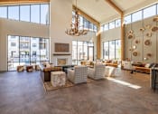 Thumbnail 2 of 22 - Spacious clubhouse lounge with high ceilings at Timber Club Apartments, St. Peters, Missouri