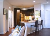 Thumbnail 7 of 63 - Fitted Kitchen With Island Dining at Vanguard Crossing, Missouri