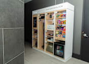 Thumbnail 22 of 37 - Smart rental store with beverage cooler and snacks at 1134 Fulton Street Apartments, Brooklyn, NY 11216