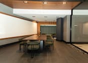 Thumbnail 7 of 37 - Private dining room with upholstered banquette seating at 1134 Fulton Street Apartments, Brooklyn, NY 11216