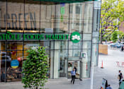 Thumbnail 43 of 56 - the front of a whole foods market store on a city street at The Paxton, New york