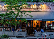 Thumbnail 48 of 56 - people sitting at tables outside of a restaurant at The Paxton, Brooklyn, 11201