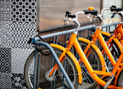 Thumbnail 54 of 56 - a row of bikes parked next to a window at The Paxton, Brooklyn
