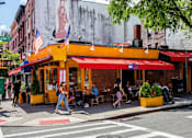 Thumbnail 49 of 56 - people walking down the street in front of a restaurant at The Paxton, Brooklyn, NY 11201