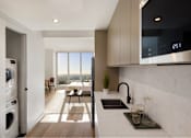 Thumbnail 34 of 56 - a kitchen with a sink and a dishwasher and a living room with a window at The Paxton, Brooklyn, NY 11201