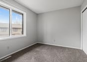 Thumbnail 6 of 13 - an empty room with carpet and a window