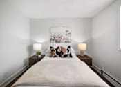 Thumbnail 53 of 53 - a bedroom with a bed and two night stands with lamps