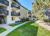 Thumbnail 8 of 31 - the preserve at ballantyne commons apartments walkway and grass