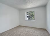Thumbnail 6 of 31 - the living room of an apartment with a window