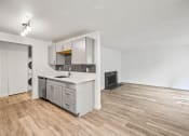 Thumbnail 22 of 42 - a kitchen and living room in a 555 waverly unit