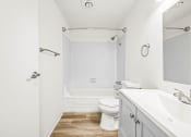 Thumbnail 14 of 42 - a bathroom with a toilet sink and bathtub