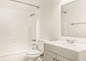 Thumbnail 5 of 42 - a bathroom with a sink toilet and bathtub