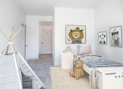 Thumbnail 7 of 42 - a white bedroom with a bed and a teddy bear
