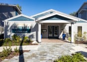 Thumbnail 1 of 43 - the entrance to bridgewater at gardner condos in front of a white building with