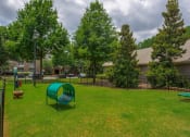 Thumbnail 34 of 34 - our apartments have a park with a playground and a green slide