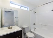 Thumbnail 7 of 9 - this is a photo of the bathroom in a 1 bedroom apartment at deer hill apartments in c