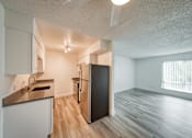 Thumbnail 6 of 36 - a kitchen and living room in a 555 waverly unit