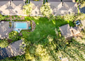 Thumbnail 12 of 25 - a birdseye view of a house with a large backyard