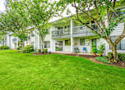 Thumbnail 3 of 25 - our apartments showcase a beautiful lawn