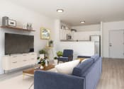 Thumbnail 5 of 42 - a living room with a blue couch and a television