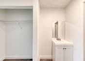 Thumbnail 16 of 24 - a bathroom with a sink and a mirror