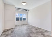 Thumbnail 20 of 74 - a room with purple and blue walls and a window