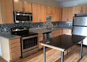 Thumbnail 39 of 73 - Large kitchen with movable island