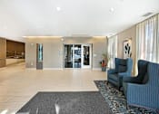 Thumbnail 42 of 73 - Open lobby with water feature