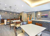 Thumbnail 49 of 73 - lounge with work from  home space