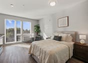 Thumbnail 1 of 61 - Bedroom with Large Windows