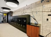 Thumbnail 30 of 61 - a map of los angeles is prominently displayed on the wall in the lobby of the building