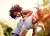 Thumbnail 58 of 61 - a father and daughter playing in the park