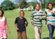 Thumbnail 55 of 61 - a group of children running in the park
