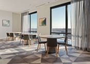 Thumbnail 9 of 24 - a room filled with furniture and a large window at Platform 4611, Chicago, IL 60640