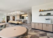 Thumbnail 11 of 24 - a communal area with tables and chairs and a kitchenette at Platform 4611, Chicago, 60640