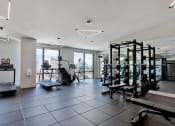 Thumbnail 20 of 24 - a gym with exercise equipment and a view of the city at Platform 4611, Illinois, 60640