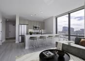 Thumbnail 6 of 24 - a kitchen and living room in a 555 waverly unit at Platform 4611, Illinois, 60640