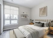 Thumbnail 25 of 28 - Bedroom with a bed and a window  at 101 Base Line Road West, London, Ontario