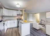 Thumbnail 5 of 23 - open concept kitchen and living area