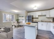 Thumbnail 7 of 23 - a kitchen and dining area