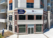 Thumbnail 2 of 37 - A building with a sign that says