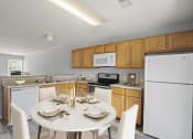 Thumbnail 36 of 48 - a kitchen with a white table and chairs and a white refrigerator