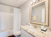 Thumbnail 9 of 43 - a bathroom with a sink and a toilet