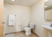 Thumbnail 43 of 43 - a bathroom with a toilet and a sink