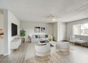 Thumbnail 1 of 43 - a living room filled with furniture and a flat screen tv