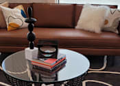 Thumbnail 5 of 10 - a bathroom with two mirrors on the floor and a shower curtain that has a picture of a