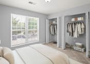 Thumbnail 22 of 48 - a bedroom with a large window and a closet with two doors