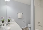 Thumbnail 46 of 48 - a bathroom with a sink and a toilet in a 555 waverly unit