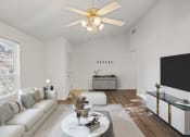 Thumbnail 8 of 15 - a living room with a couch and a coffee table