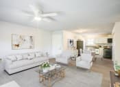 Thumbnail 14 of 43 - a living room filled with furniture and a ceiling fan